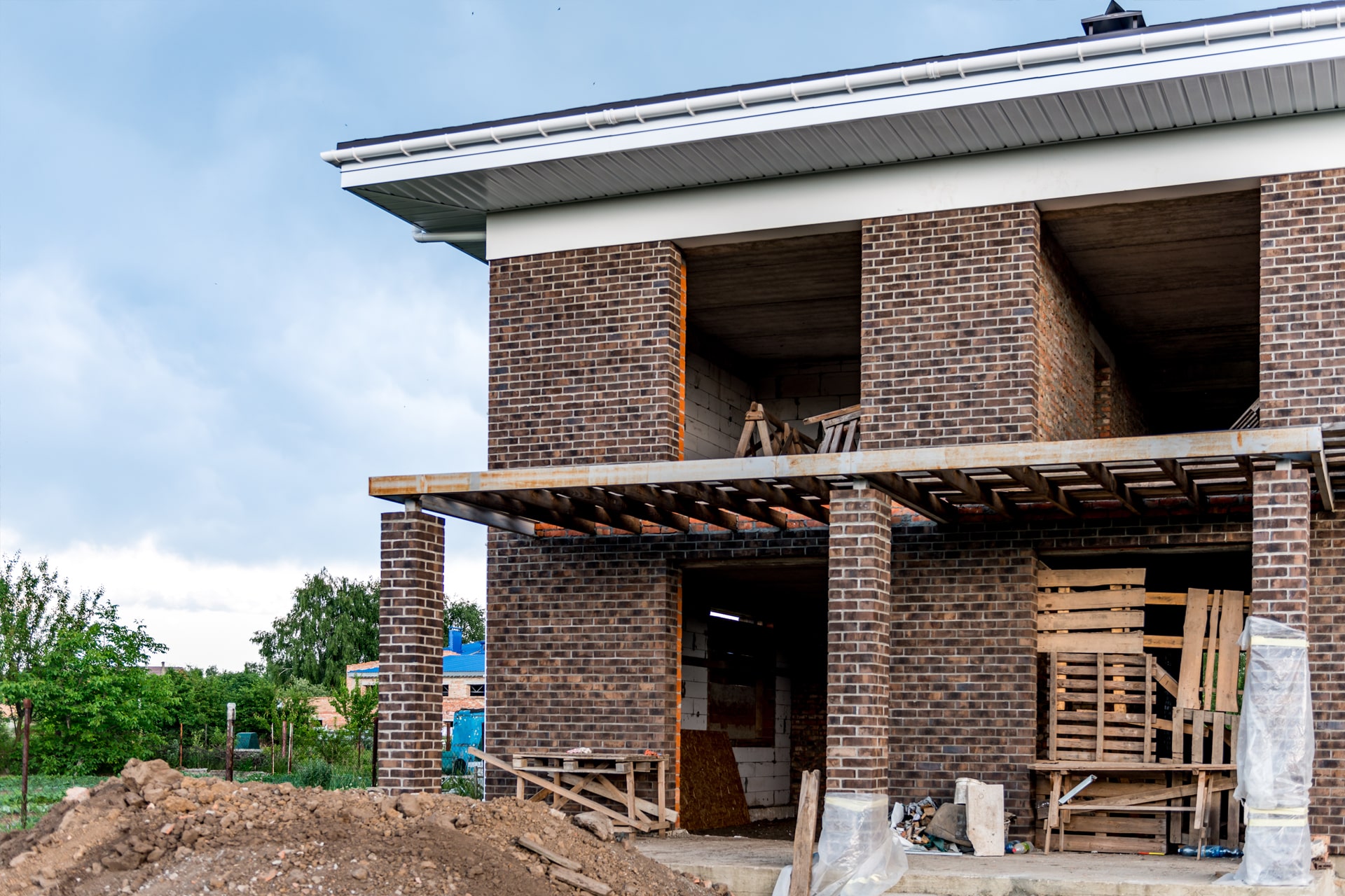 Construction of a house and a cottage-min